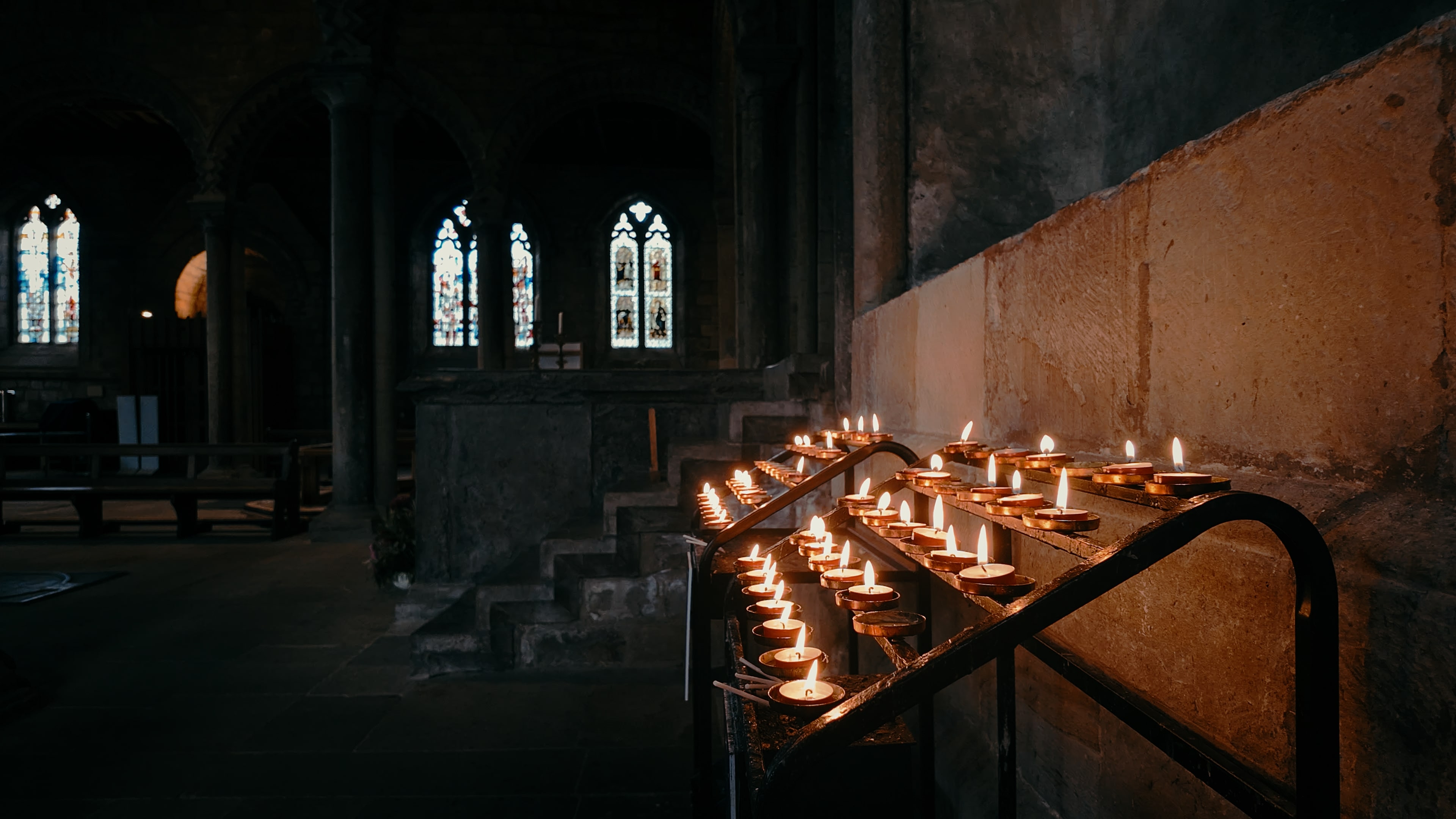 Church prayer lights at an altar